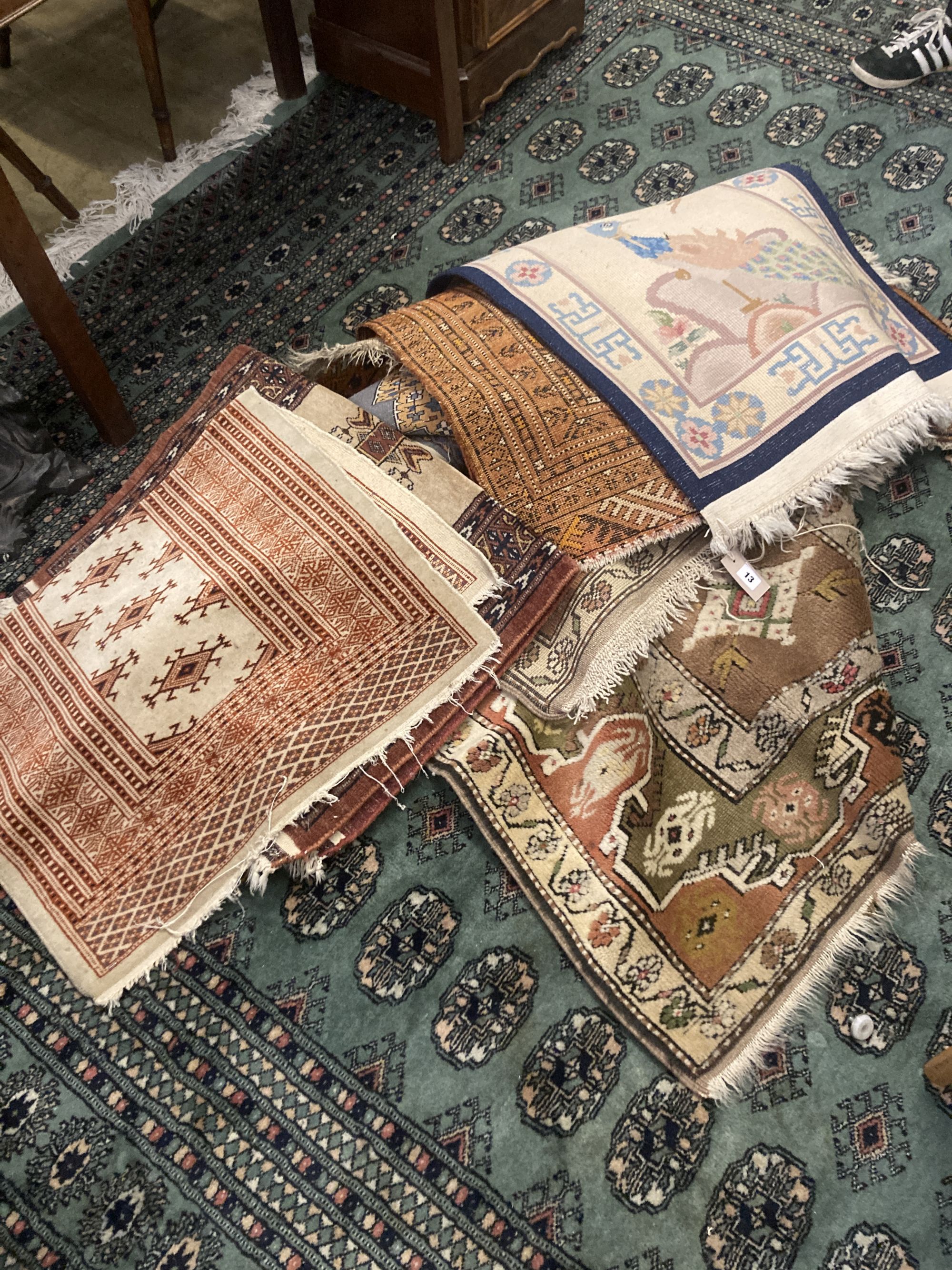 Ten Caucasian, Bokhara and North West Persian prayer mats and rugs and a Chinese mat, largest 150 x 96cm